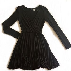 Long sleeve wrap style black mini dress